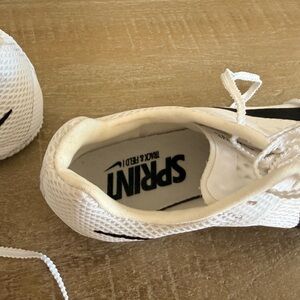 Nike Kids White Sneakers with Black Swoosh